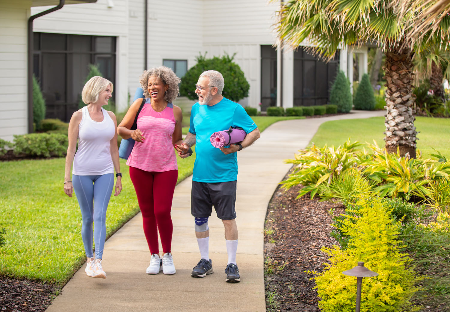 arbor terrace residents walking together after yoga class
