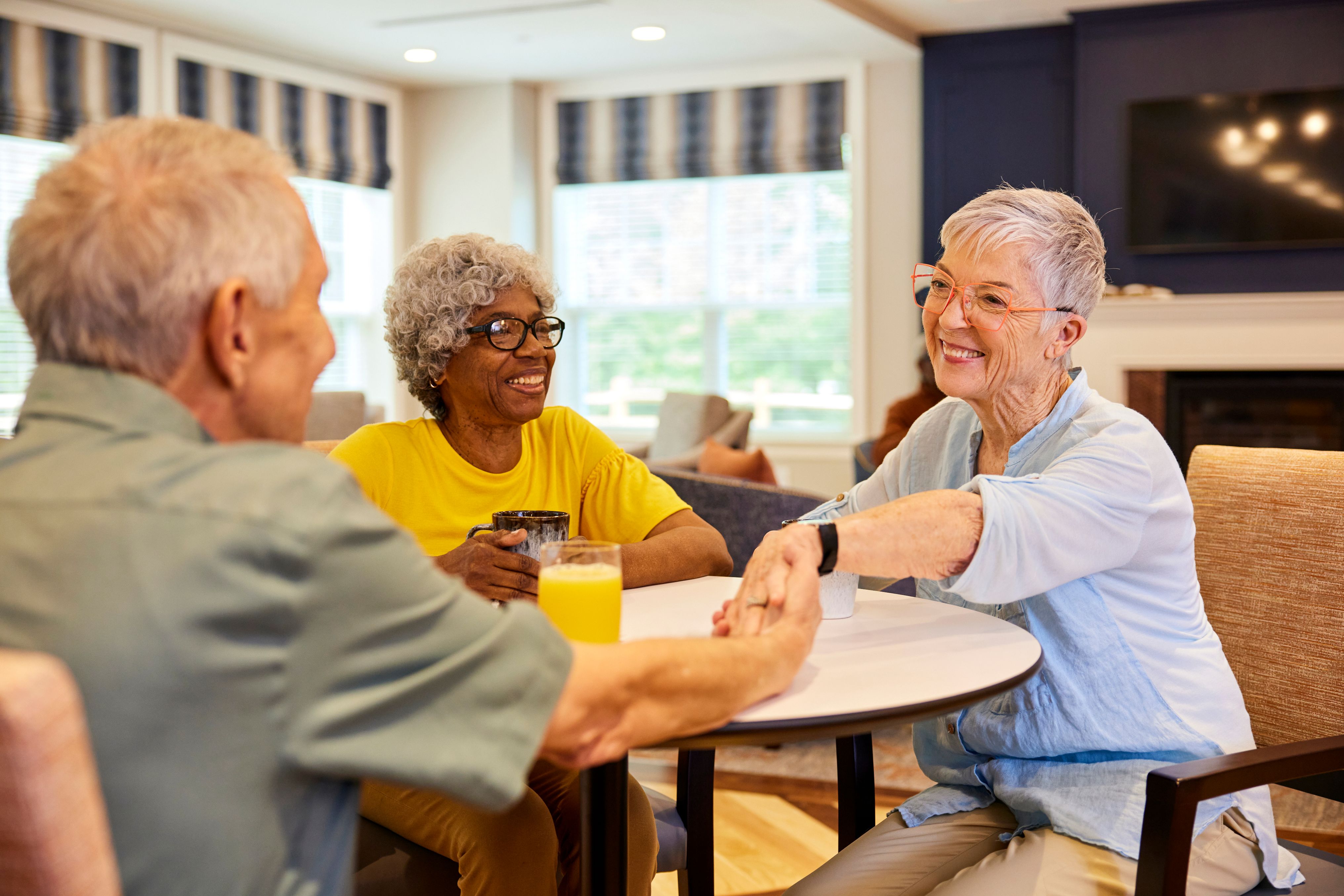 arbor terrace residents chatting at table