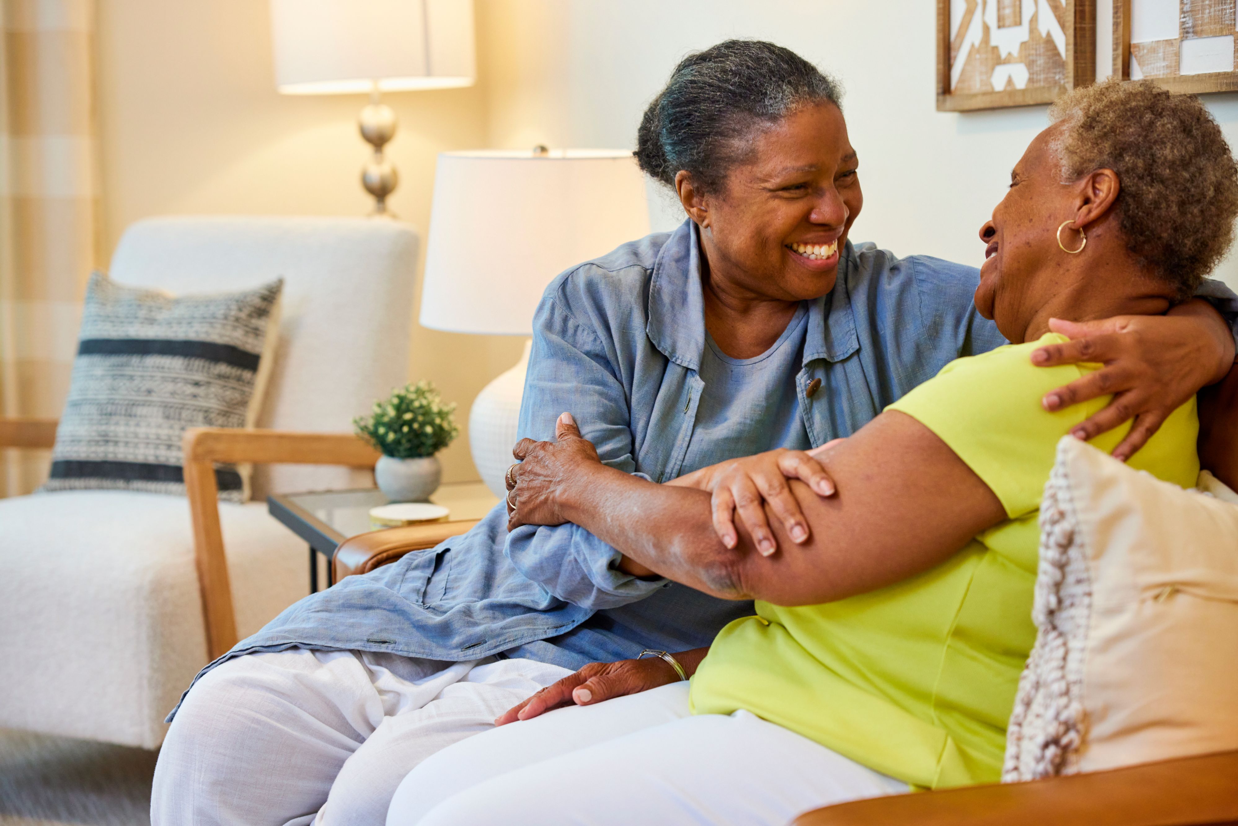 arbor terrace resident and family member hugging