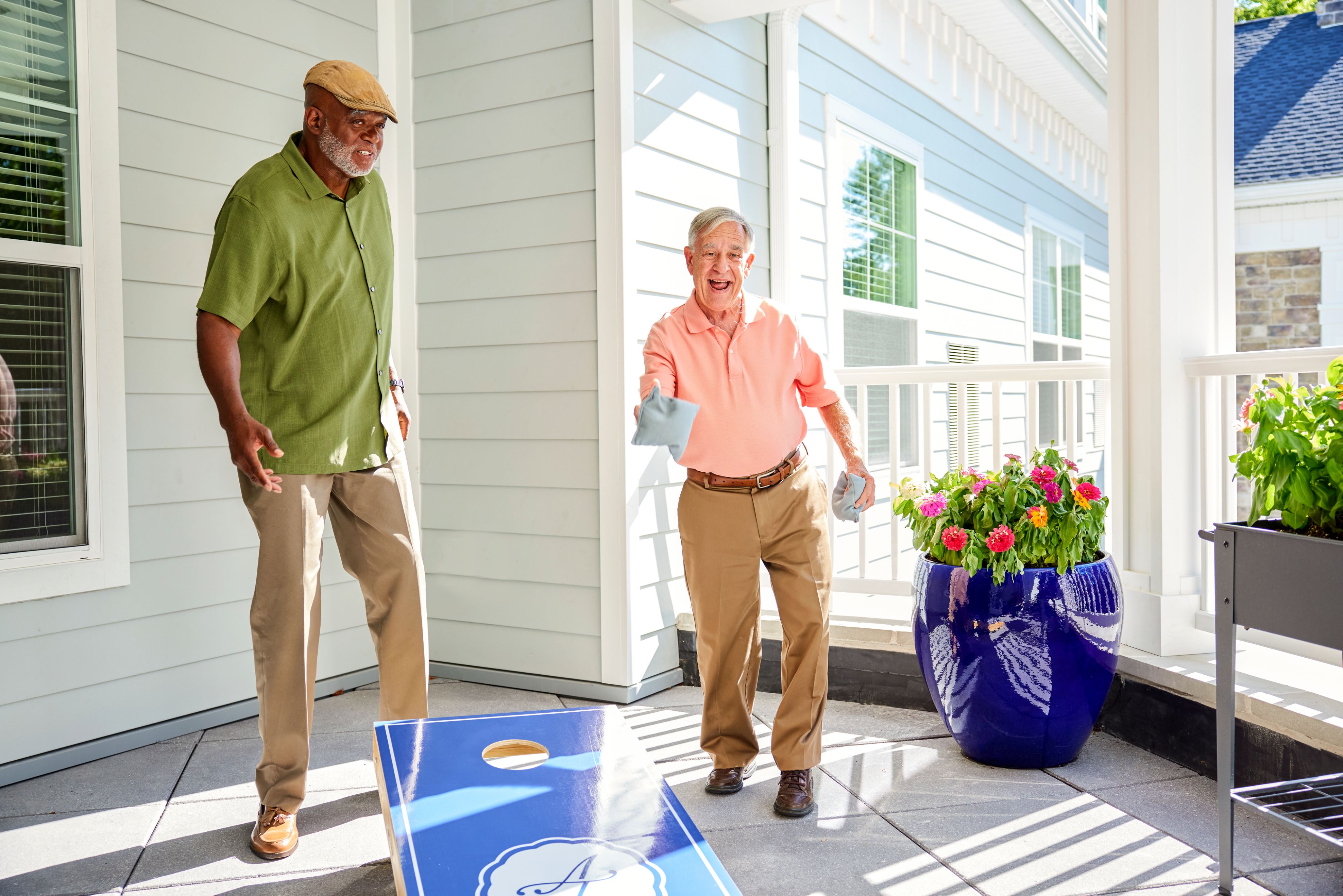 arbor terrace residents playing outdoor game