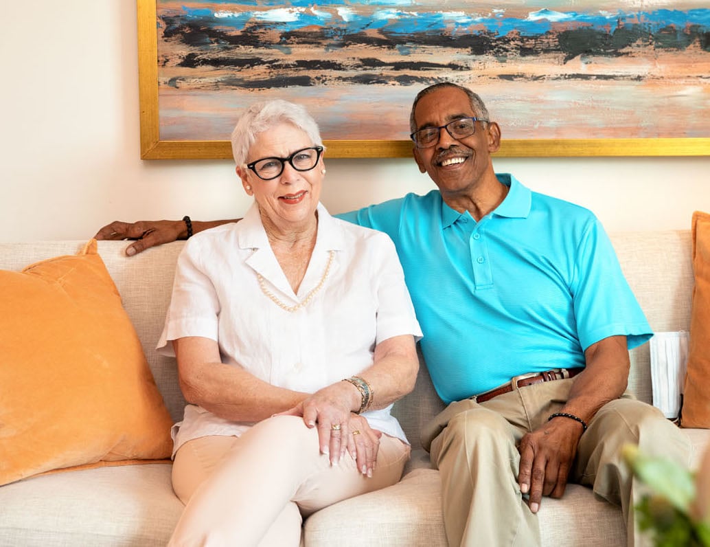 arbor terrace residents sitting on couch