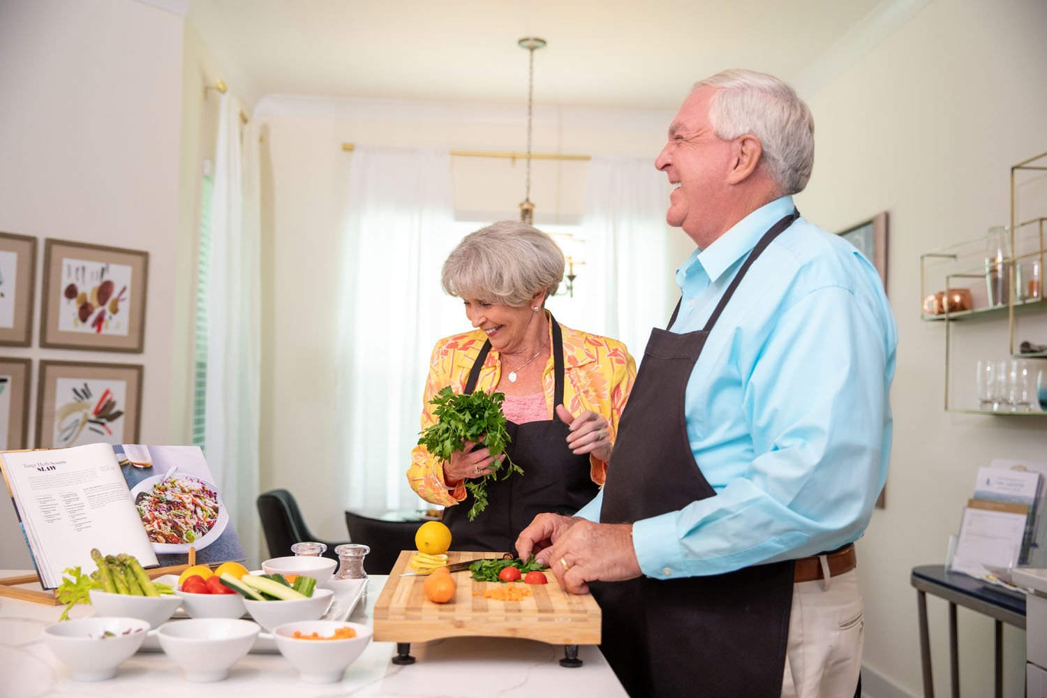 arbor terrace senior couple cooking dinner in apartment